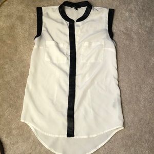 Sleeveless blouse with faux leather